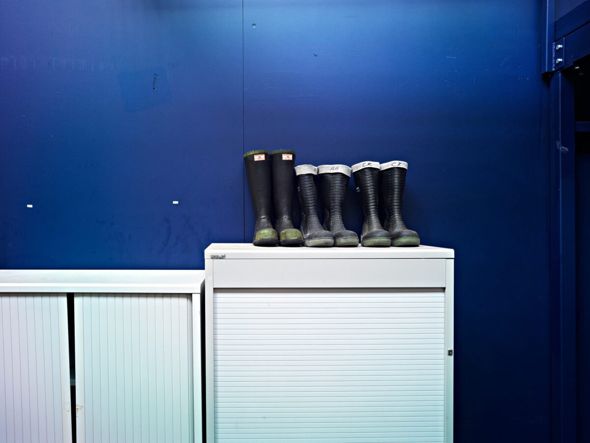 Industrial photography, ABB refinery Burghausen Germany, rubber boots at plant entrance, by Scanderbeg Sauer