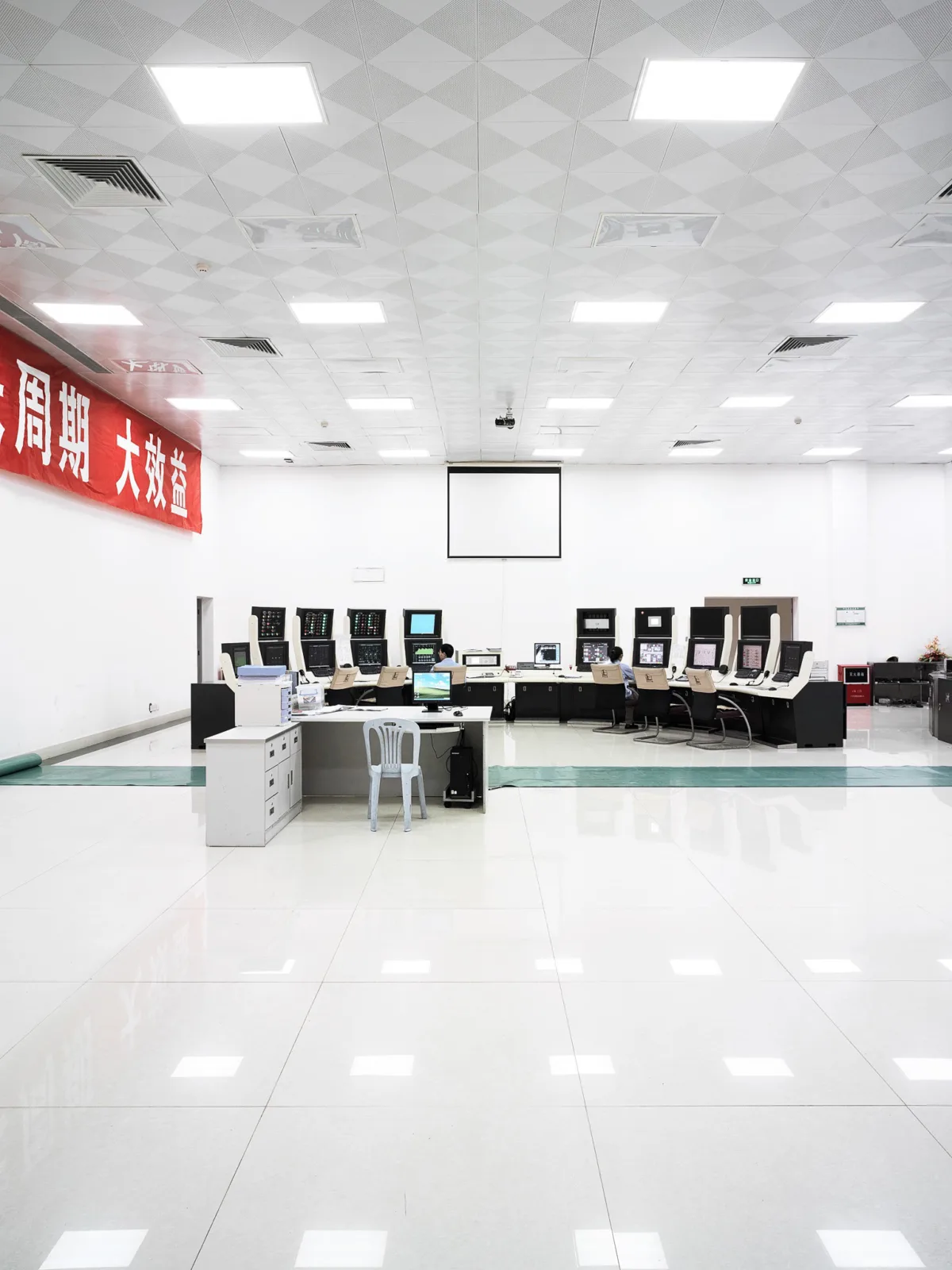 Control room with operator workstations at the facility, Burckhardt Compression, Ningbo, China, industrial photography by Scanderbeg Sauer
