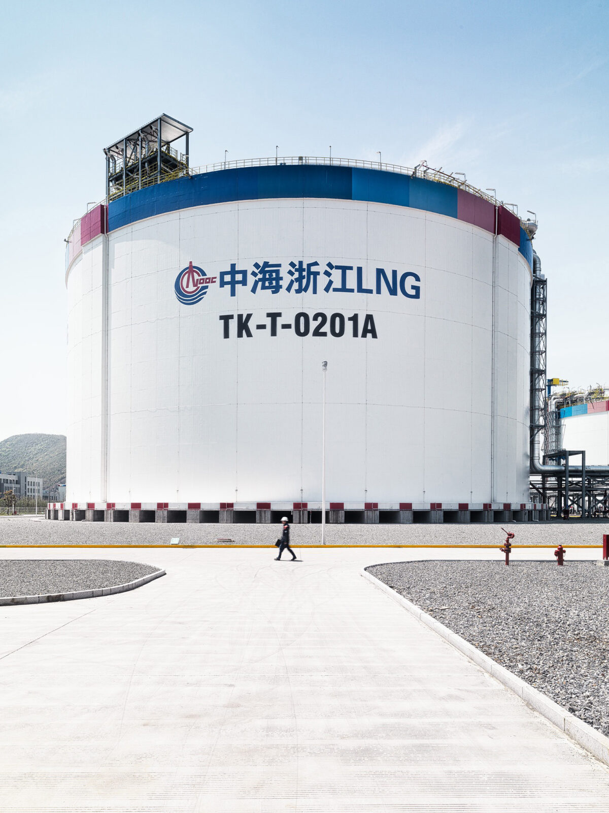 Large LNG storage tank at the CNOOC Zhejiang LNG terminal, Burckhardt Compression, Ningbo, China, industrial photography by Scanderbeg Sauer