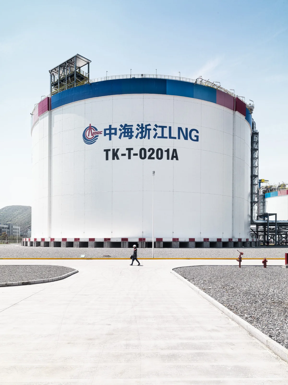 Large LNG storage tank at the CNOOC Zhejiang LNG terminal, Burckhardt Compression, Ningbo, China, industrial photography by Scanderbeg Sauer