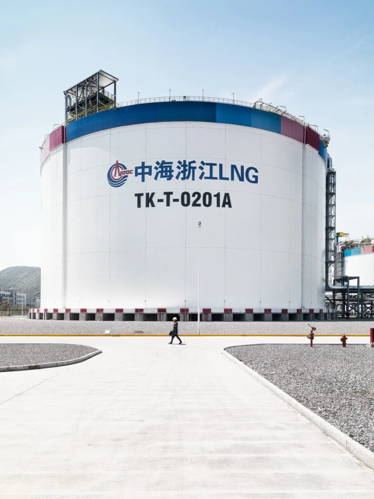 Large LNG storage tank at the CNOOC Zhejiang LNG terminal, Burckhardt Compression, Ningbo, China, industrial photography by Scanderbeg Sauer