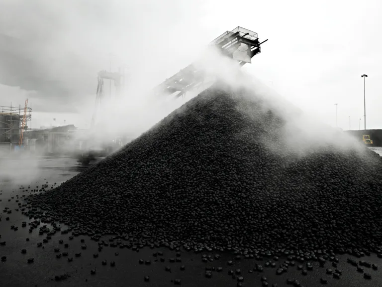 Coal stockpile with steam, CPL Industries, Cleethorpes, United Kingdom, industrial photography by Scanderbeg Sauer