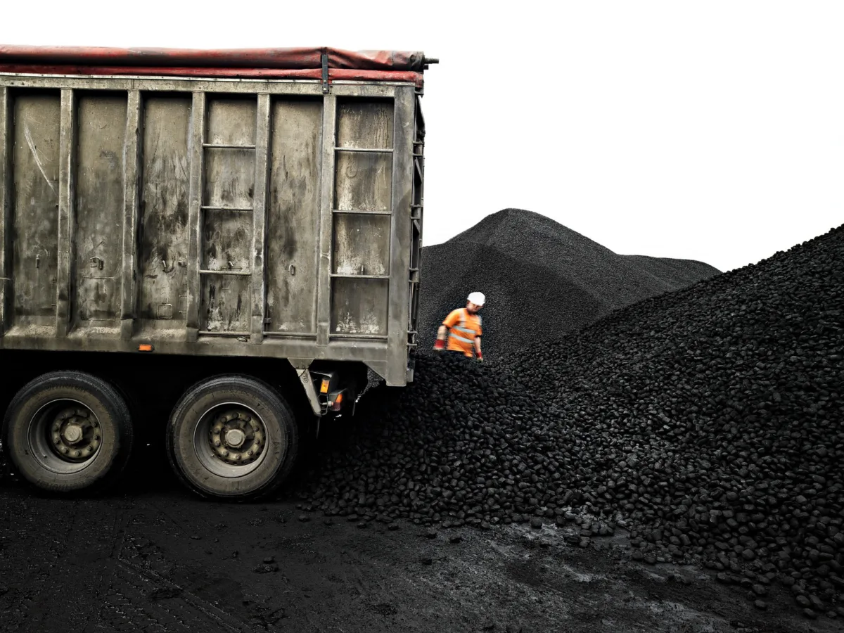 Tipper truck handling bulk coal, CPL Industries, Cleethorpes, United Kingdom, industrial photography by Scanderbeg Sauer