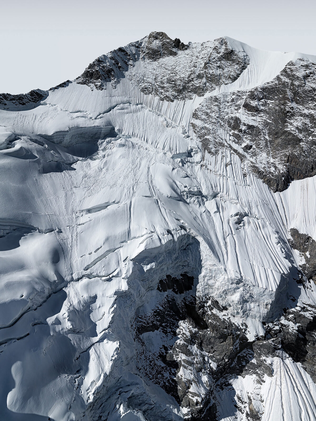 Exposed rock and receding ice at Bernina Pass, Eternal Ice, Bernina, Switzerland, landscape photography by Scanderbeg Sauer