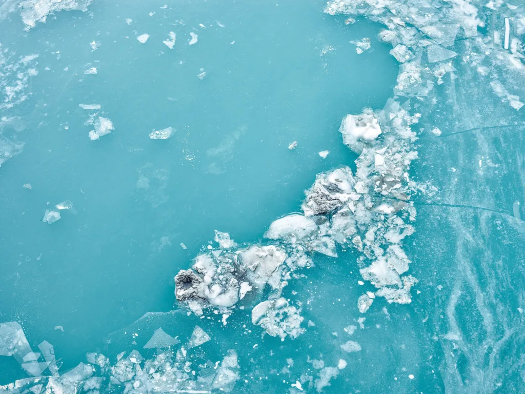 Ice floes on a turquoise glacial lake, Eternal Ice, Zmutt, Switzerland, landscape photography by Scanderbeg Sauer
