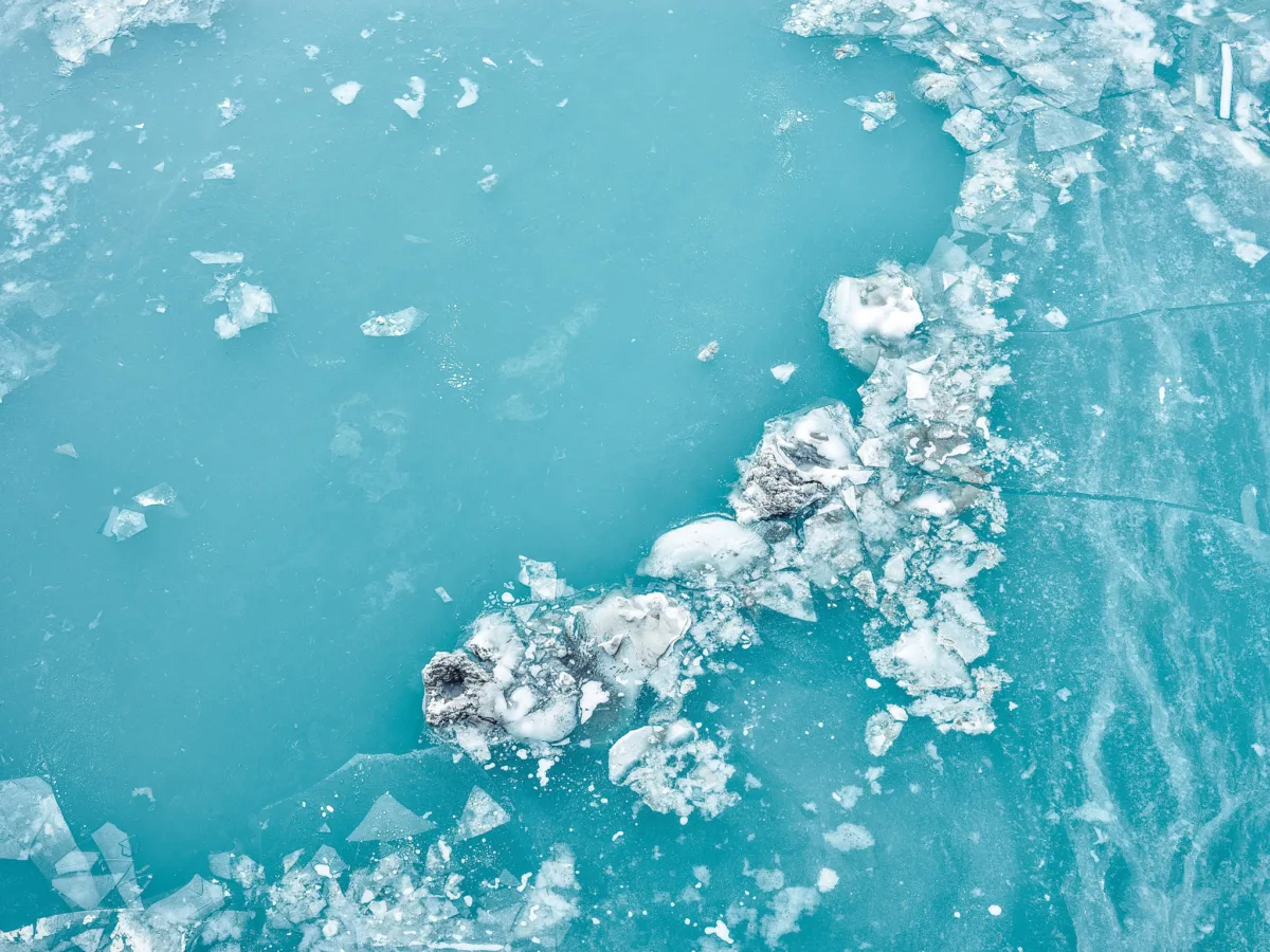 Ice floes on a turquoise glacial lake, Eternal Ice, Zmutt, Switzerland, landscape photography by Scanderbeg Sauer