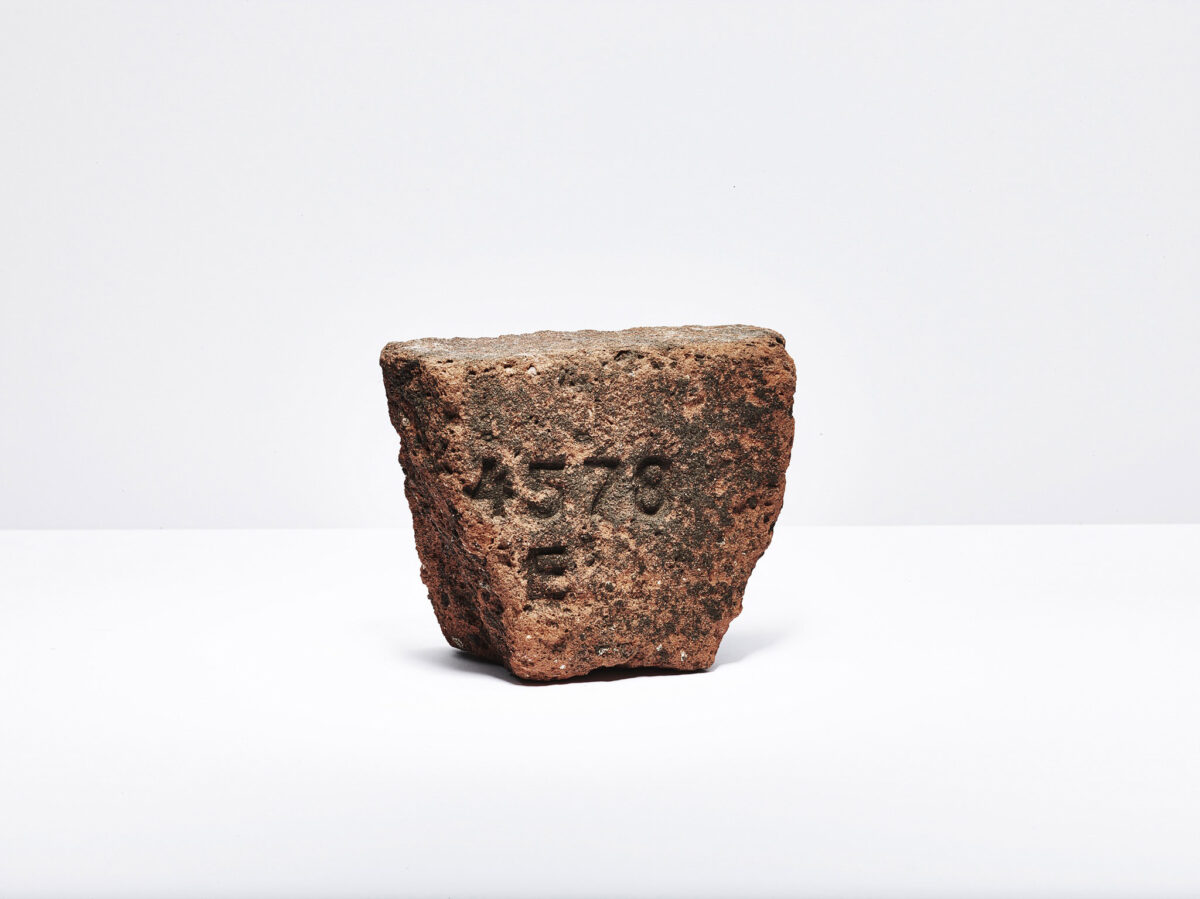Engraved marker stone as a found object, Furka Pass, Obergoms, Switzerland, still life by Scanderbeg Sauer