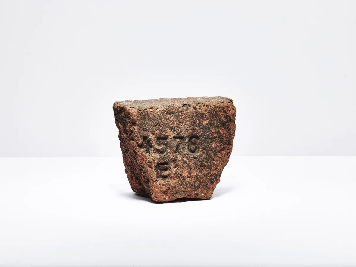 Engraved marker stone as a found object, Furka Pass, Obergoms, Switzerland, still life by Scanderbeg Sauer