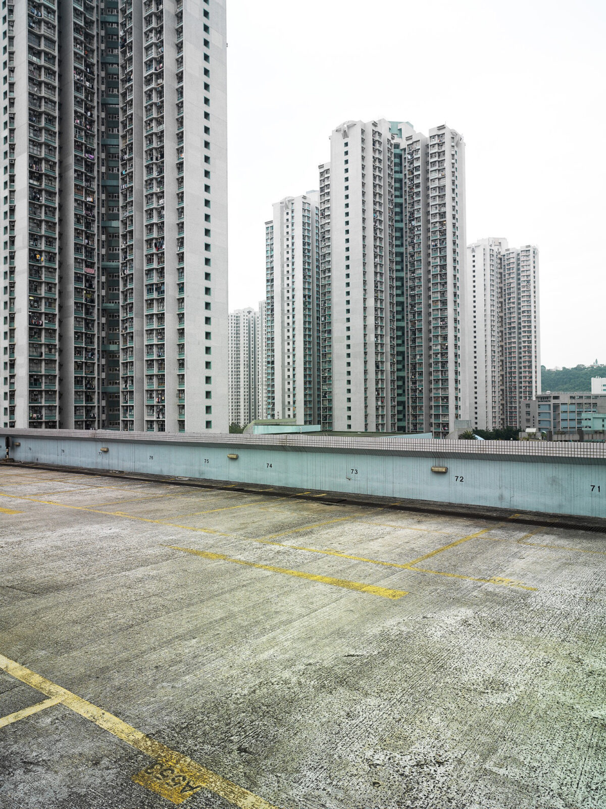 High-rise residential towers seen from a rooftop, Hong Kong, cityscape photography by Scanderbeg Sauer