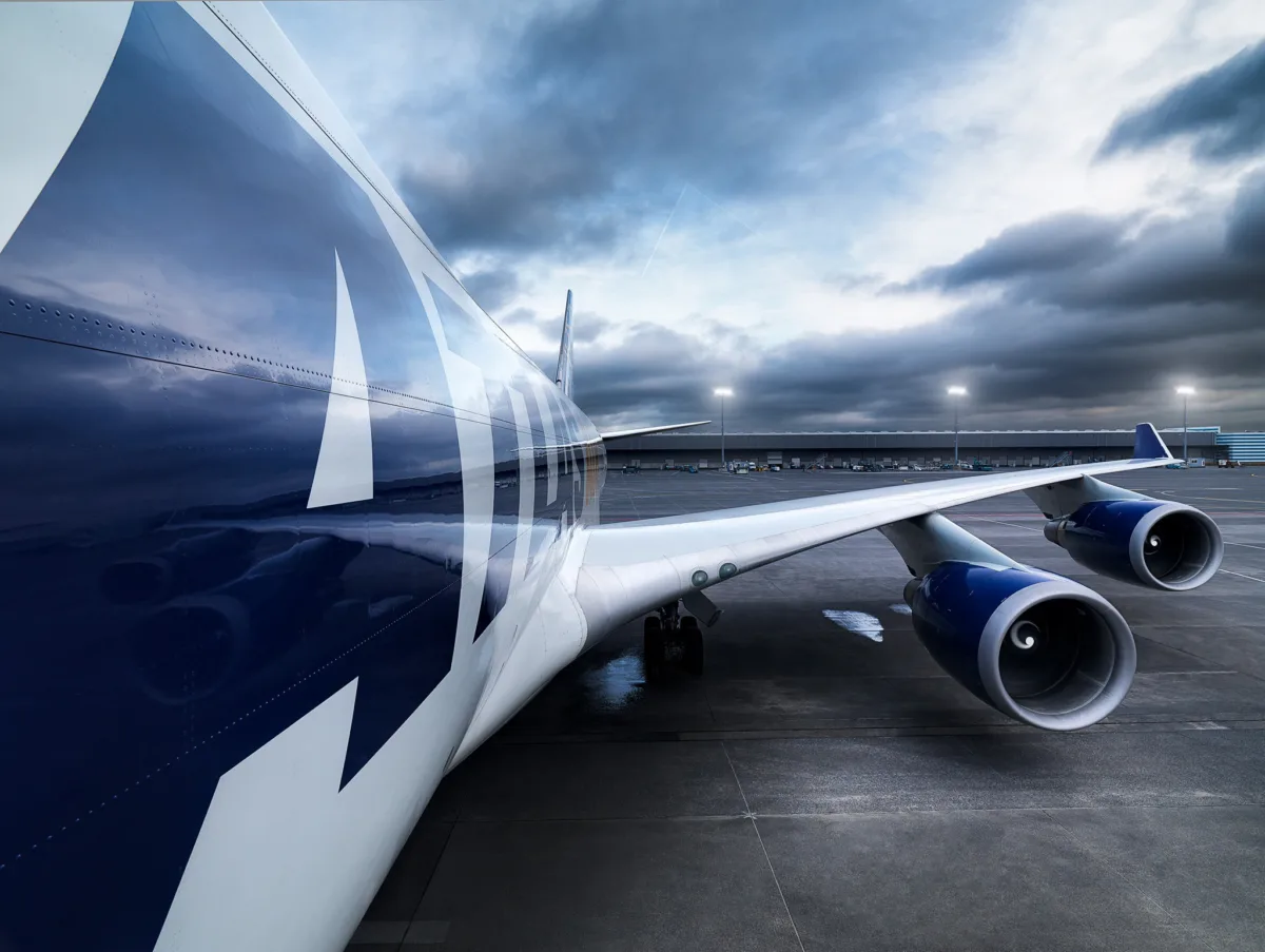 Panalpina cargo aircraft on the apron at dusk, Findel Airport, Luxembourg, air freight photography by Scanderbeg Sauer