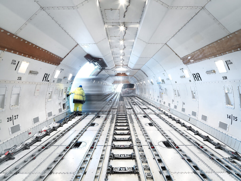 Cargo aircraft loading deck with roller floor, Panalpina, Findel Airport, Luxembourg, air freight photography by Scanderbeg Sauer