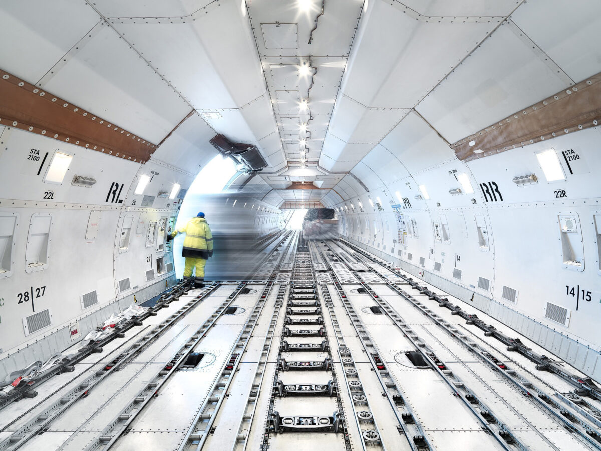 Cargo aircraft loading deck with roller floor, Panalpina, Findel Airport, Luxembourg, air freight photography by Scanderbeg Sauer
