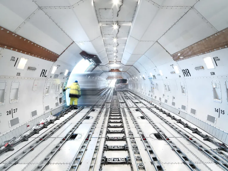 Cargo aircraft loading deck with roller floor, Panalpina, Findel Airport, Luxembourg, air freight photography by Scanderbeg Sauer