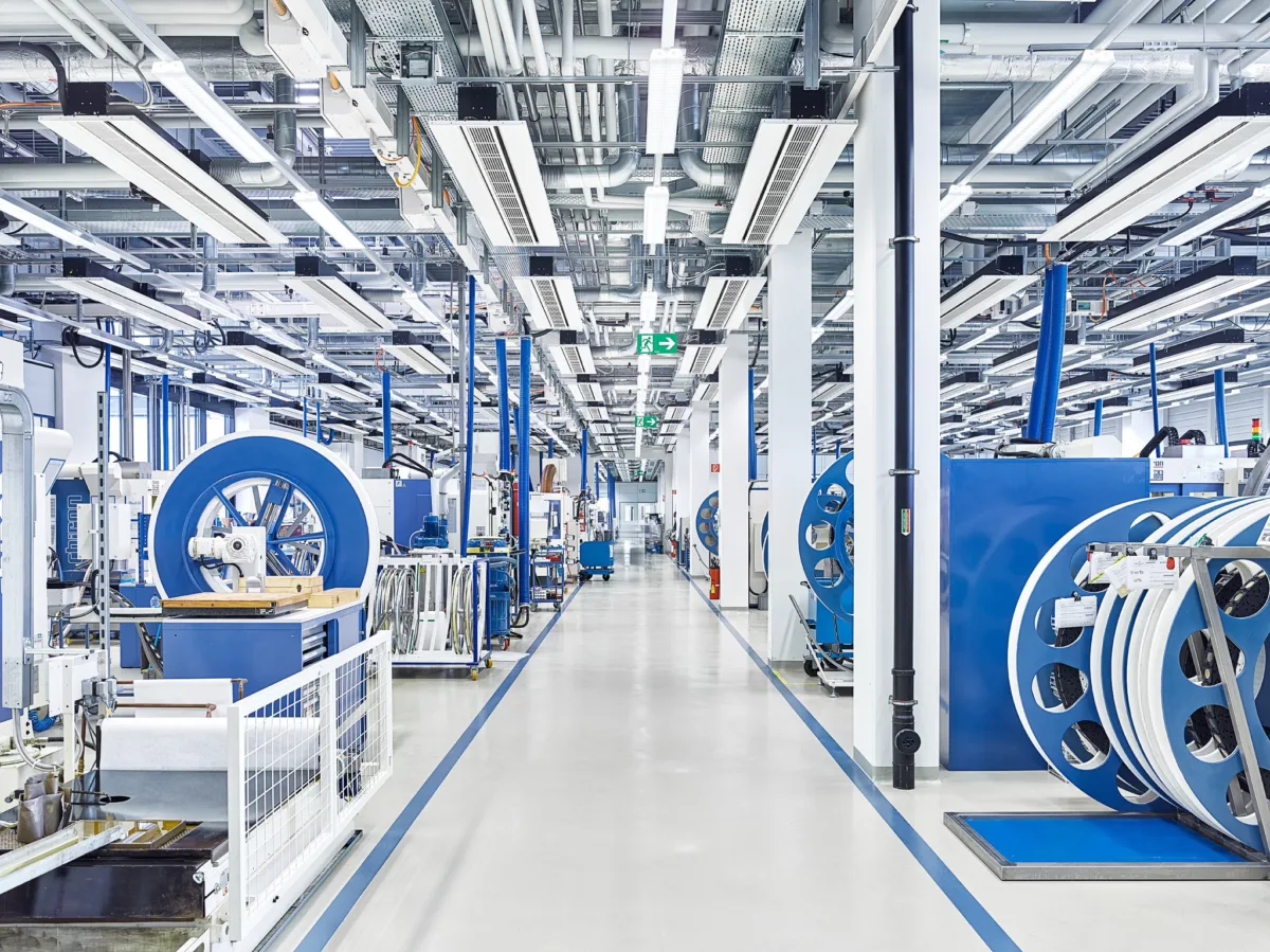 Manufacture production hall with machinery, Patek Philippe for Fortune Magazine, USA, watchmaking photography by Scanderbeg Sauer