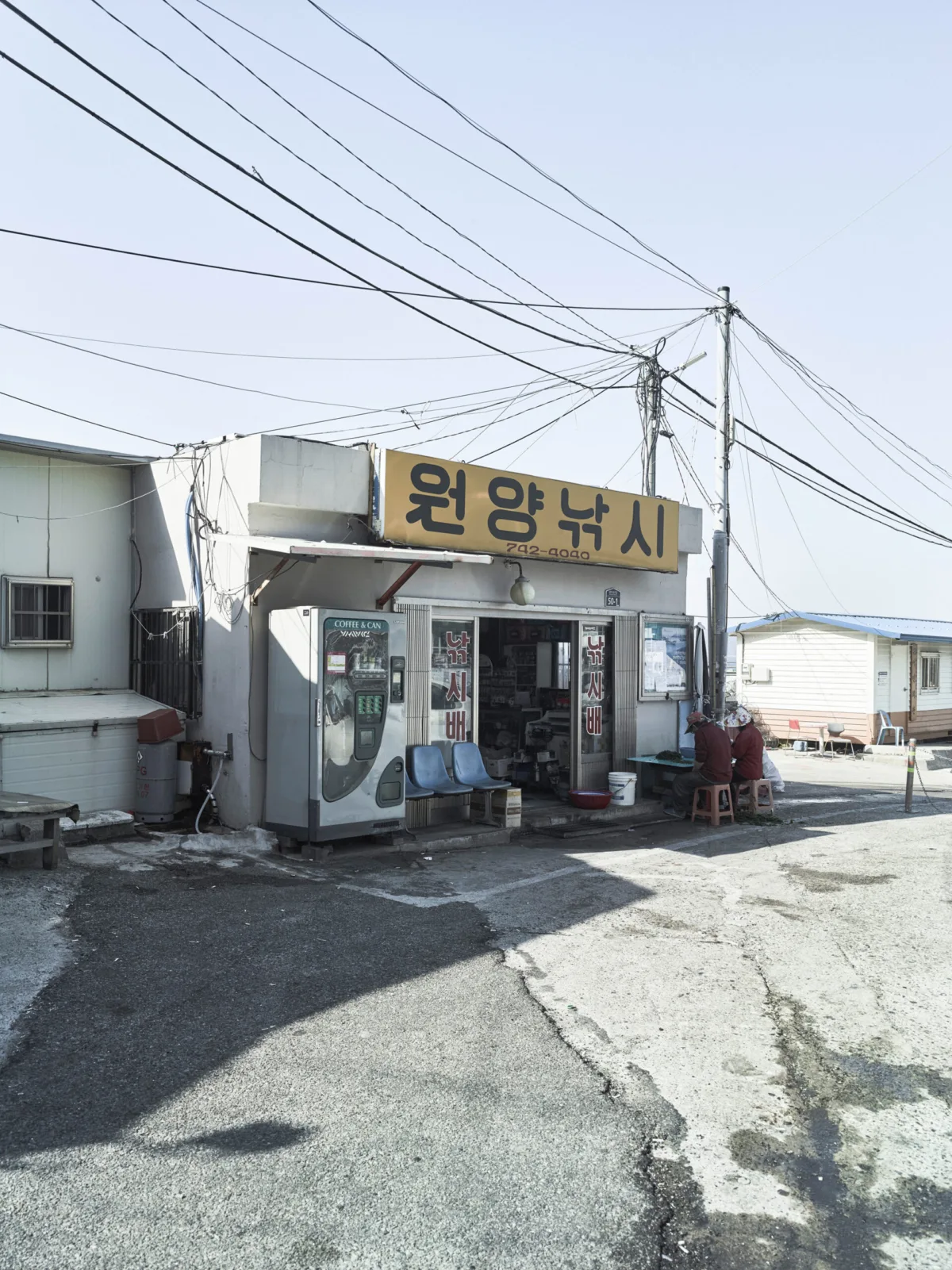 Fishing shop storefront, Busan, South Korea, street photography by Scanderbeg Sauer