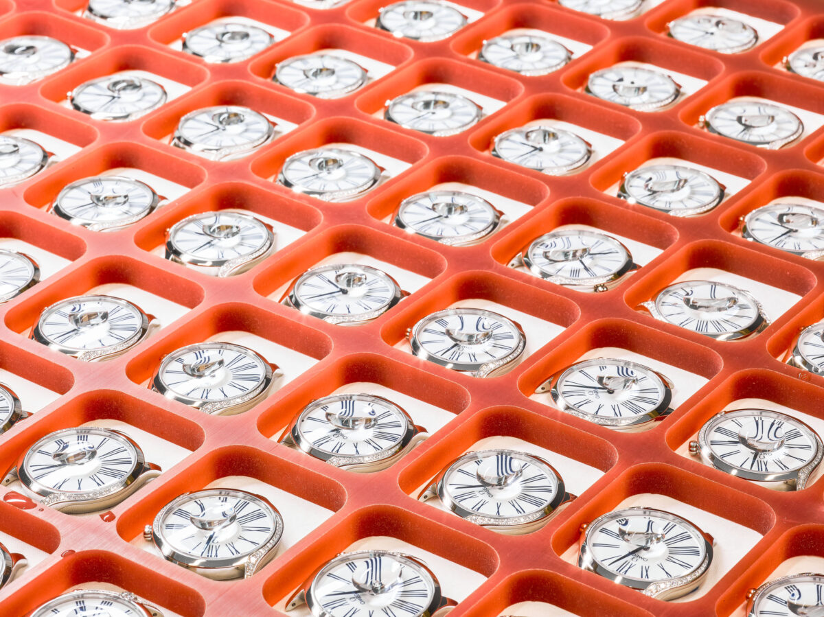 Watch movements in a production tray, Omega, Bienne, Switzerland, watchmaking photography by Scanderbeg Sauer