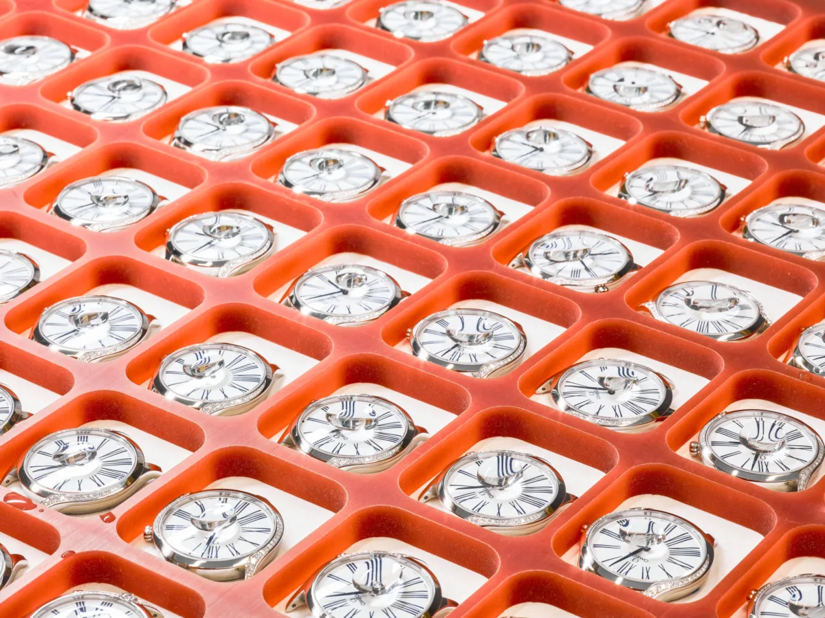 Watch movements in a production tray, Omega, Bienne, Switzerland, watchmaking photography by Scanderbeg Sauer