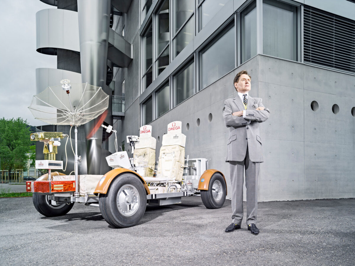 Editorial portrait of Nicholas Foulkes with Lunar Roving Vehicle, Omega, London, UK, portrait photography by Scanderbeg Sauer