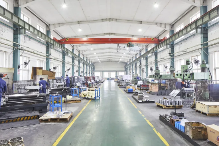 Production hall with machine tools and overhead crane, Shenyang Yuanda Compressor, Shenyang, China, industrial photography by Scanderbeg Sauer