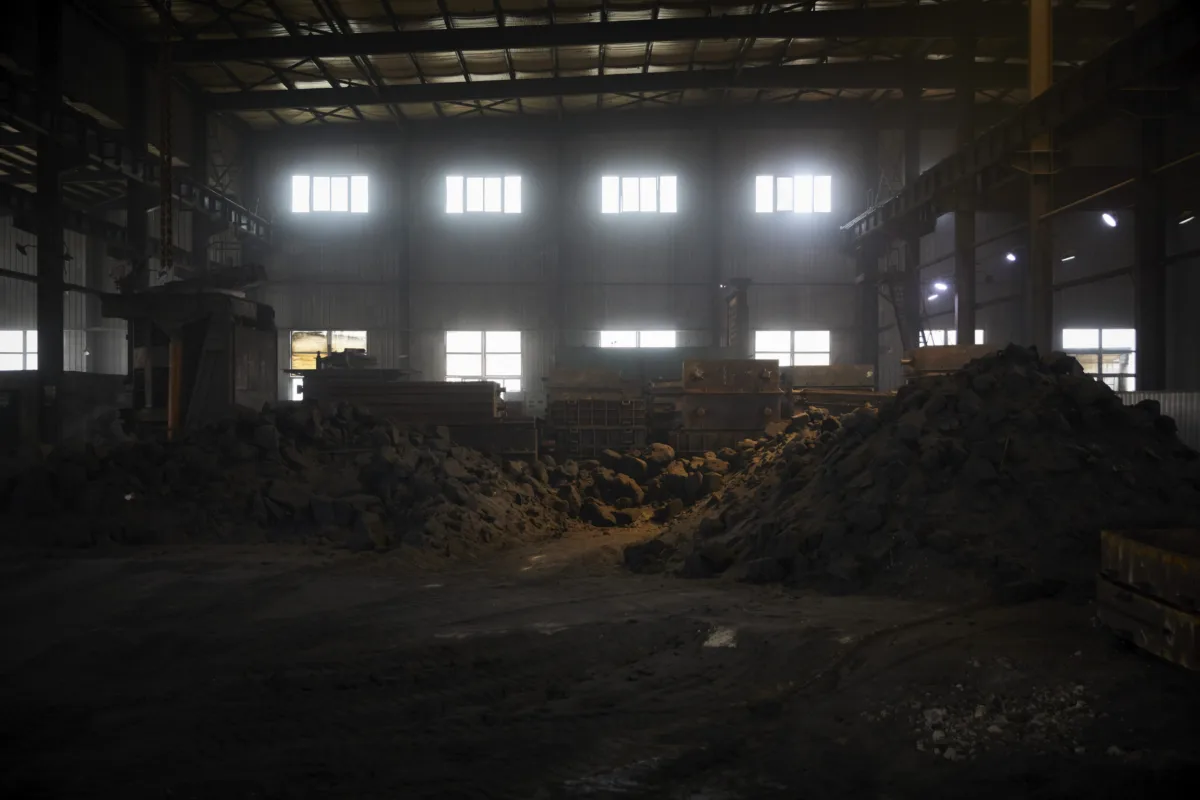 Foundry hall interior with moulding sand, Shenyang Yuanda Foundry, Shenyang, China, industrial photography by Scanderbeg Sauer