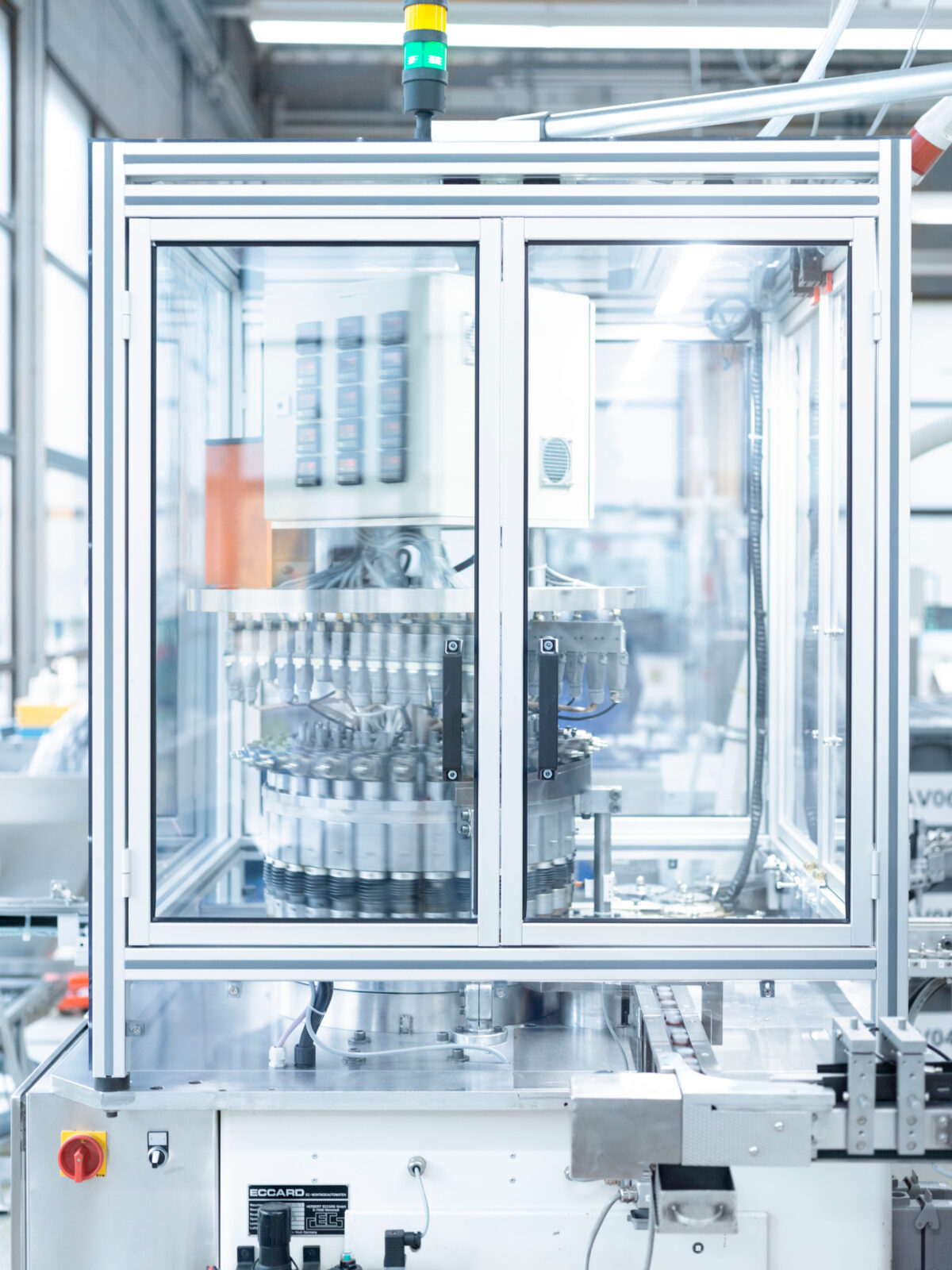 Automated vial production machine, Datwyler, Alken, Belgium, industrial photography by Scanderbeg Sauer