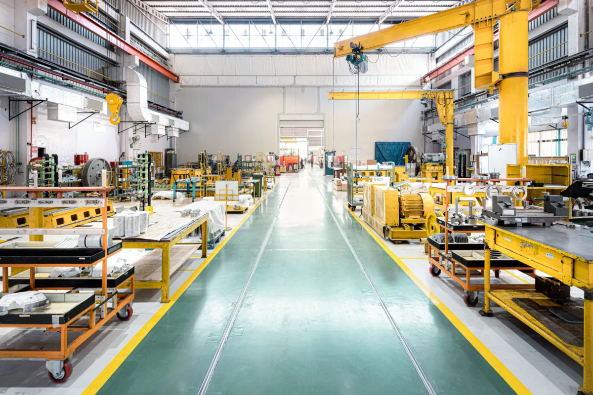 Production hall with assembly line at the Pune facility, Burckhardt Compression, Pune, India, industrial photography by Scanderbeg Sauer