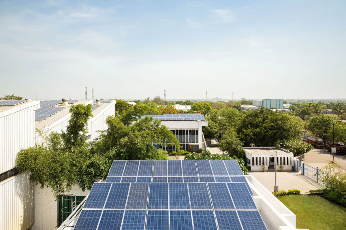 Rooftop solar panels on the production facility, Burckhardt Compression, Pune, India, industrial photography by Scanderbeg Sauer