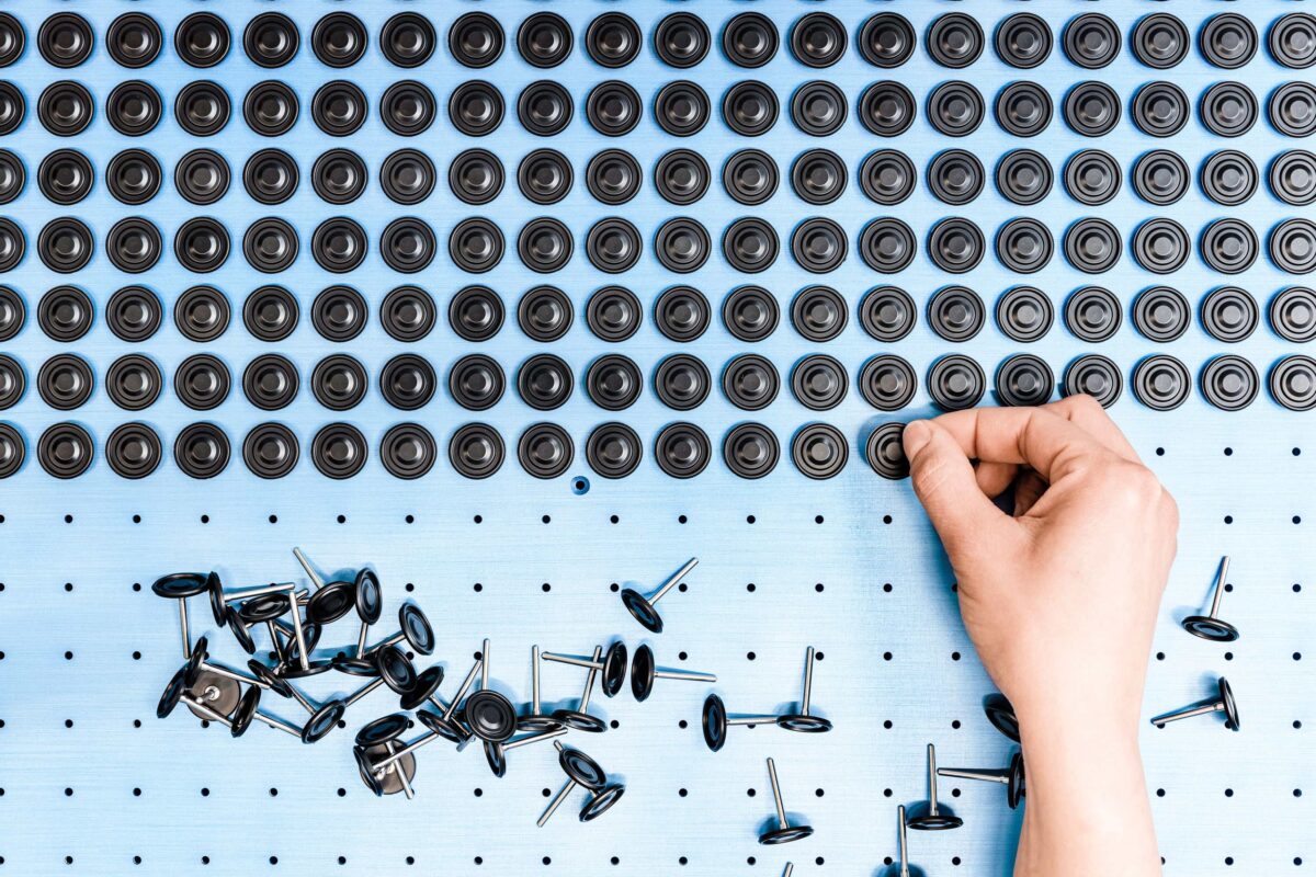 Rubber sealing components on a sample tray at Datwyler Sealing Solutions, Swissmem, Association of MEM Industries, Switzerland, industrial photography by Scanderbeg Sauer