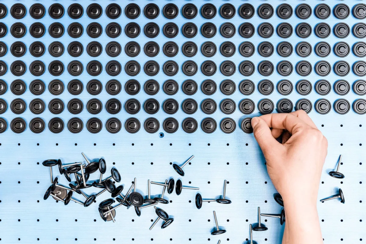 Rubber sealing components on a sample tray at Datwyler Sealing Solutions, Swissmem, Association of MEM Industries, Switzerland, industrial photography by Scanderbeg Sauer