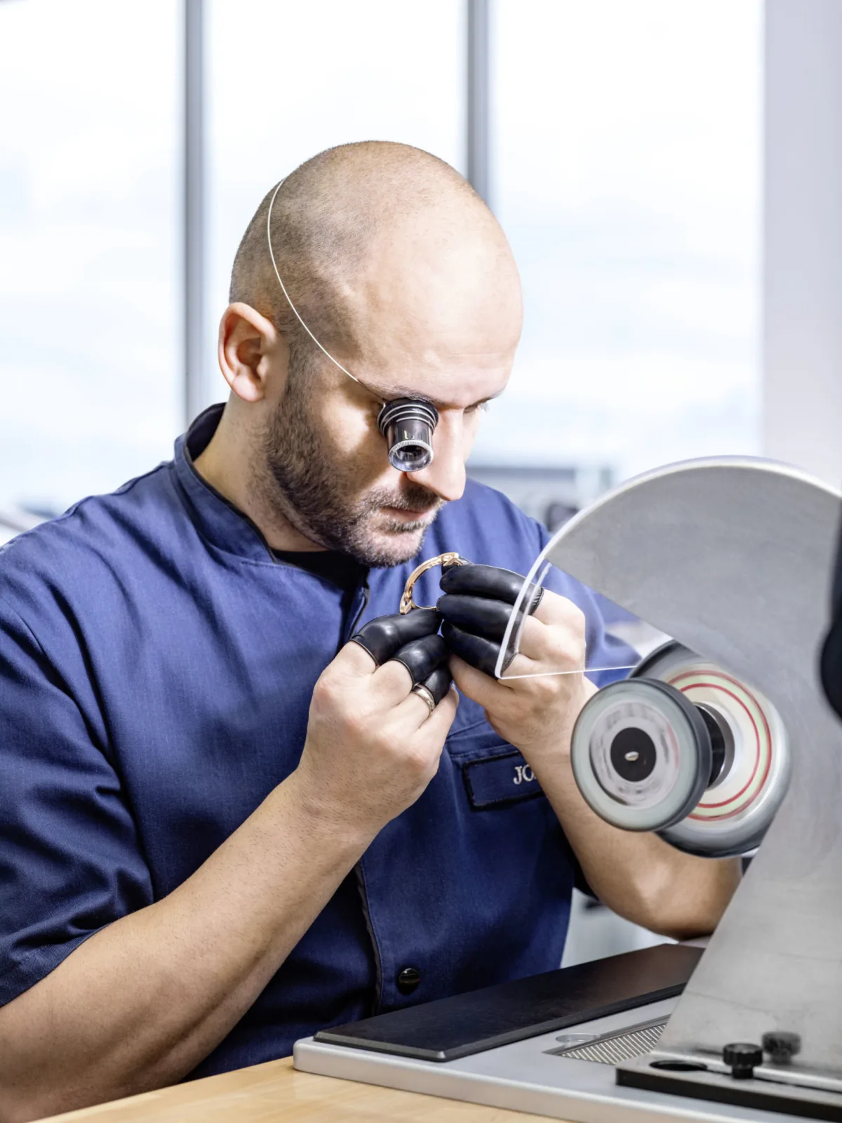 Watchmaking photography, Audemars Piguet watchmaker hand-finishing Code 11.59 case, Le Brassus, by Scanderbeg Sauer