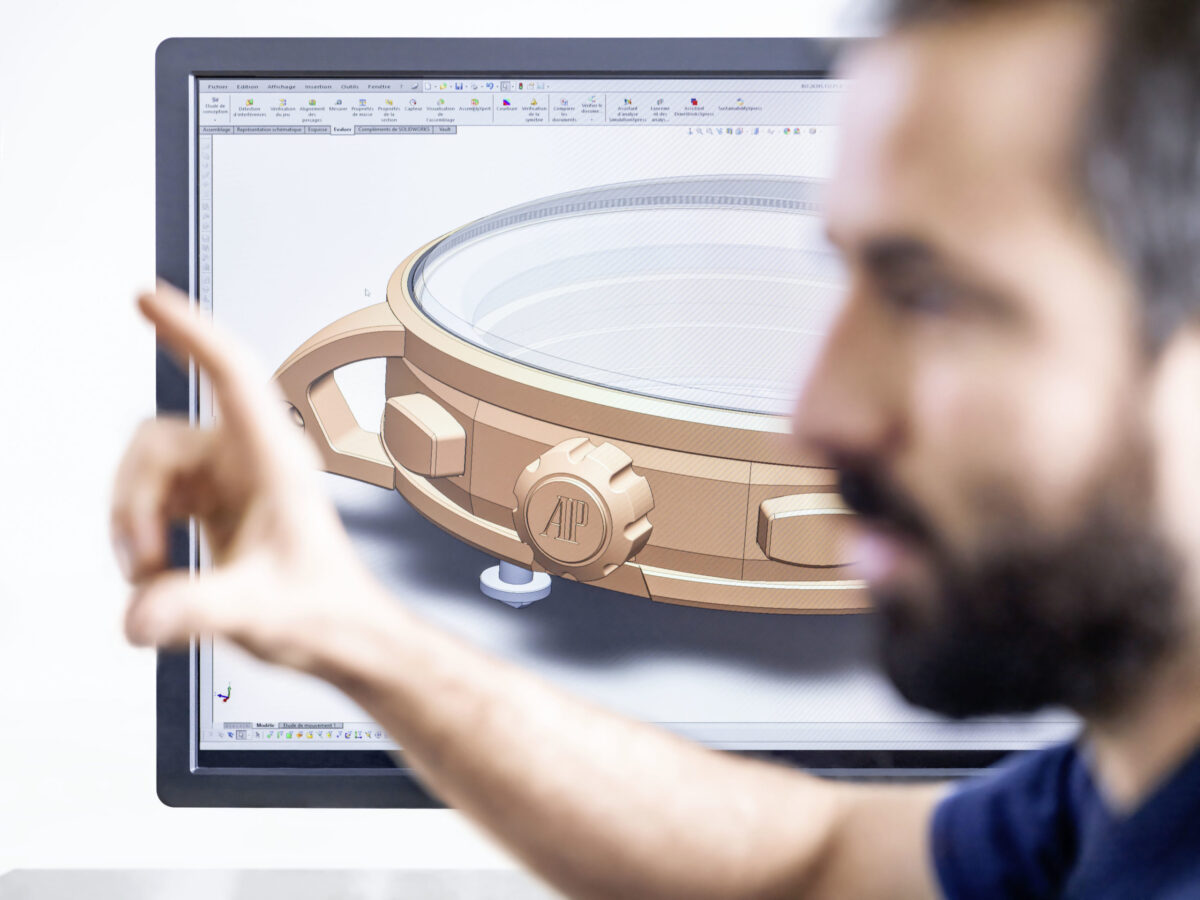 Watchmaking photography, Audemars Piguet watchmaker examining Code 11.59 case, Le Brassus, by Scanderbeg Sauer