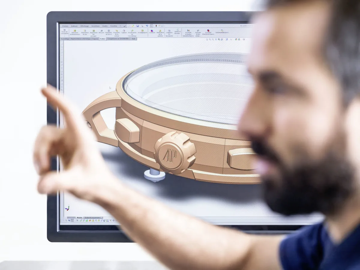 Watchmaking photography, Audemars Piguet watchmaker examining Code 11.59 case, Le Brassus, by Scanderbeg Sauer