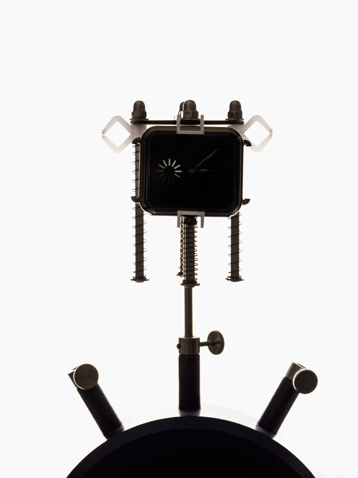 Watchmaking photography, H. Moser & Cie. Swiss Alp Watch on watchmaker's fixture, Vantablack dial, by Scanderbeg Sauer