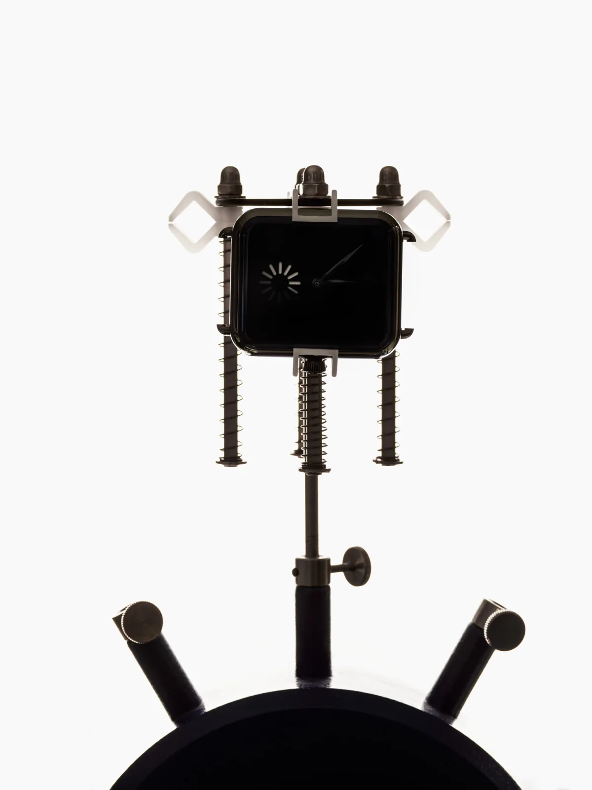 Watchmaking photography, H. Moser & Cie. Swiss Alp Watch on watchmaker's fixture, Vantablack dial, by Scanderbeg Sauer