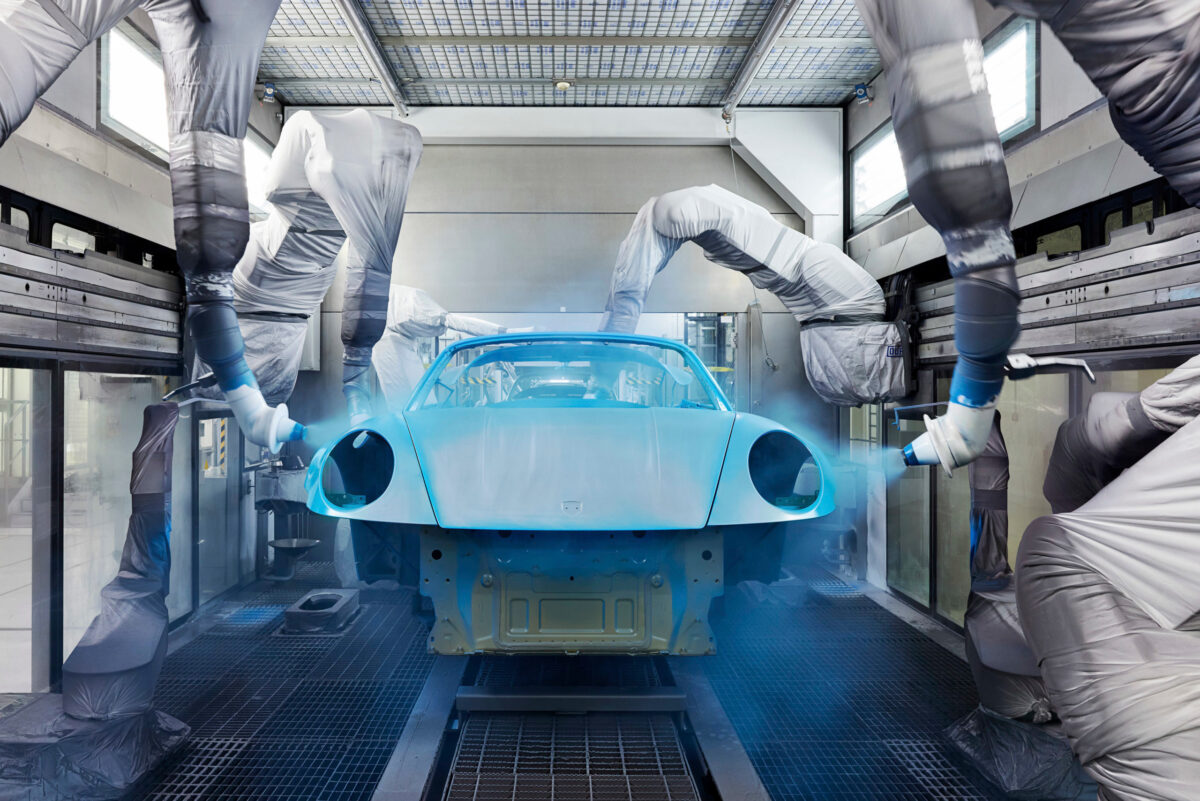Automotive photography, paint robots coating Porsche 911 Cabriolet in Mexico Blue, paint booth Zuffenhausen, automotive photography by Scanderbeg Sauer