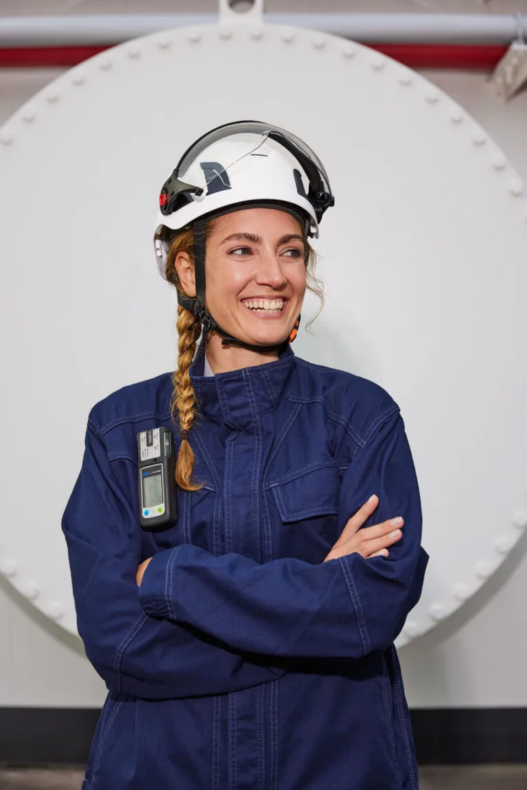 Worker portrait in protective overall and helmet, Ambrian Energy Bremen, corporate photography by Scanderbeg Sauer