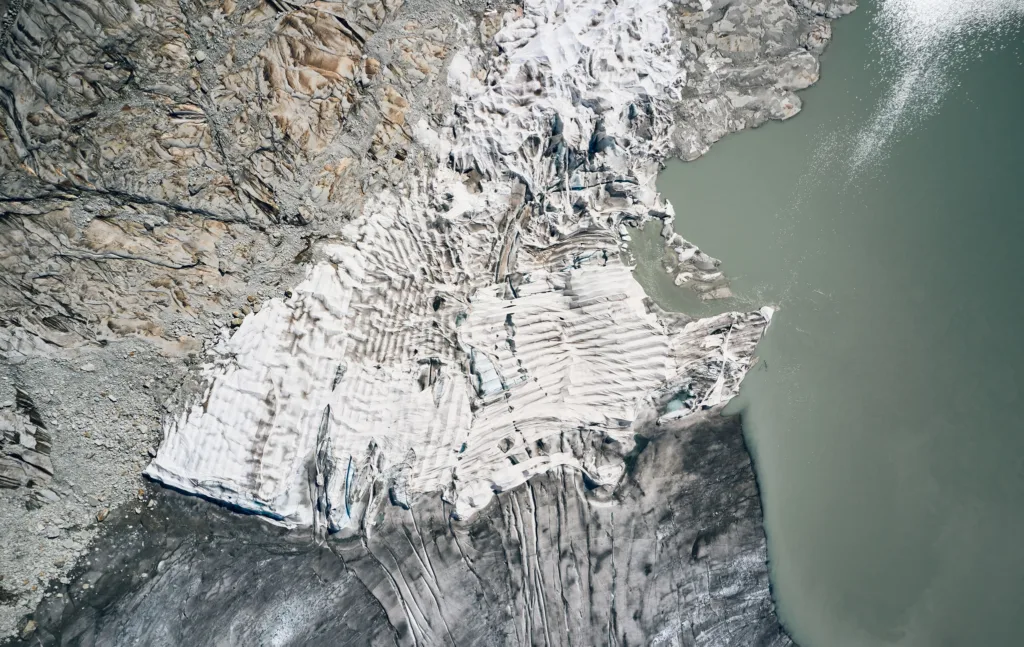 Aerial view of the Rhône glacier with white insulating blankets, Eternal Ice, Rhône, Switzerland, landscape photography by Scanderbeg Sauer