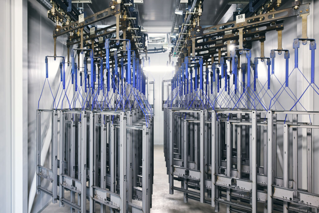 Coating line with conveyor system at Geberit Lichtenstein, industrial photography by Scanderbeg Sauer