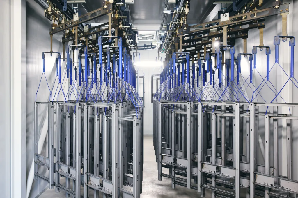 Coating line with conveyor system at Geberit Lichtenstein, industrial photography by Scanderbeg Sauer