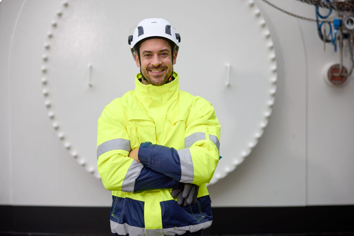 Worker portrait in protective gear at Ambrian Energy Bremen, corporate photography by Scanderbeg Sauer